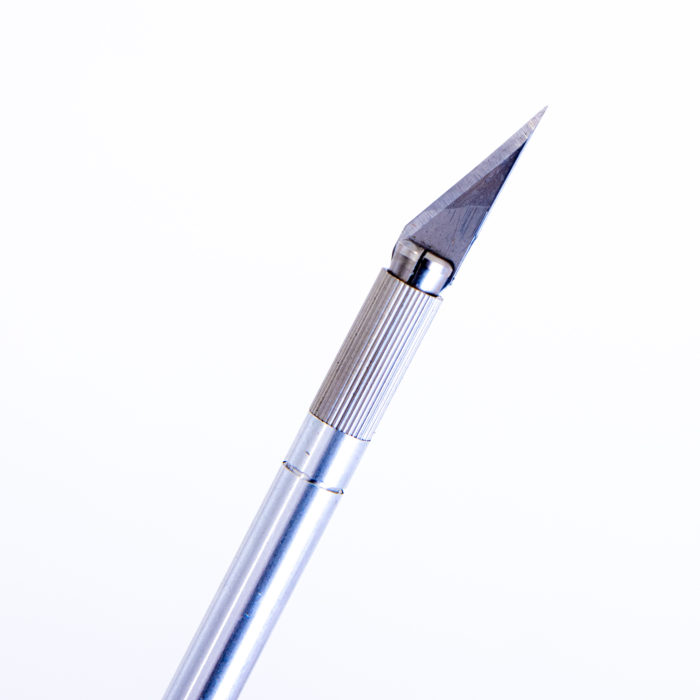 Scalpel | to remove the sheath from your guitar and pedalboard cables